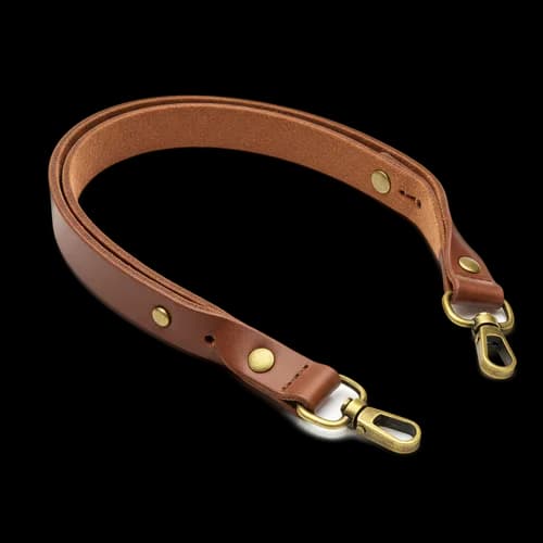 Tracolla per fotocamera in pelle marrone con clip in ottone