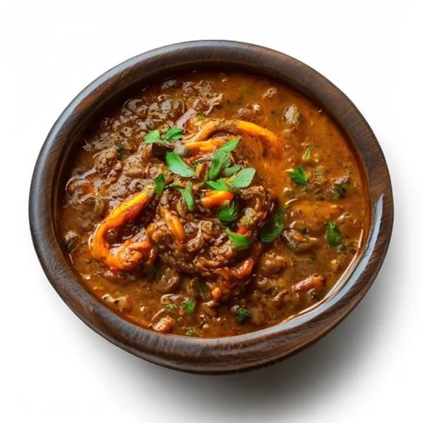 Scharfes Pakistanisches Haleem: Dicker Linsen- und Fleischbrei